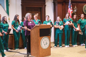 Junior year PSU nursing students listen as Dr. Julie Fagan speaks