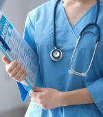 A nurse holding a clipboard