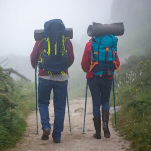 People hiking in the fog