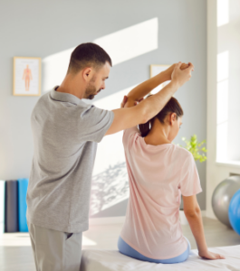 Allied health worker assisting a patient